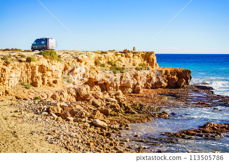 Camper van on sea cliff, camping. Camper van on sea cliff, camping. 113505786