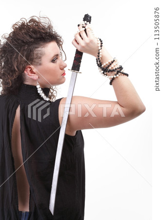 Portrait curly woman curly girl and sword Portrait curly woman curly girl and sword 113505876