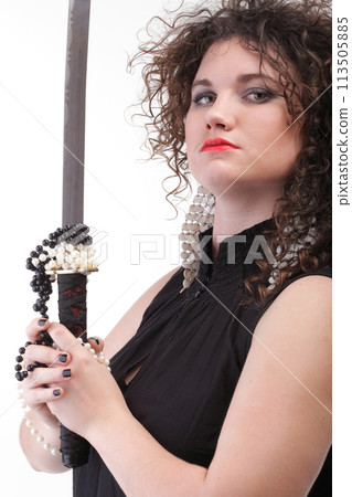Portrait curly woman curly girl and sword Portrait curly woman curly girl and sword 113505885