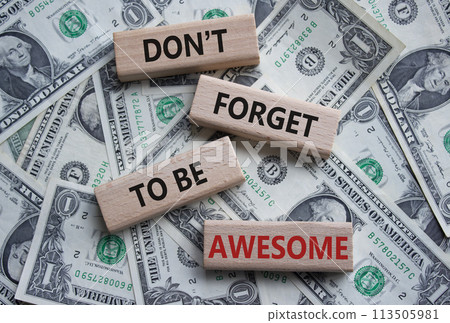 Do not forget to be Awesome symbol. Concept word Do not forget to be Awesome on wooden blocks. Beautiful dollar background. Motivation concept. Copy space Do not forget to be Awesome symbol. Concept word Do not forget to be Awesome on wooden blocks. Beautiful dollar background. Motivation concept. Copy space 113505981
