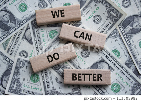 We Can Do Better symbol. Concept words We Can Do Better on wooden blocks. Beautiful dollar background. Business and We Can Do Better concept. Copy space. We Can Do Better symbol. Concept words We Can Do Better on wooden blocks. Beautiful dollar background. Business and We Can Do Better concept. Copy space. 113505982