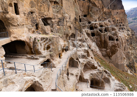 Vardzia ancient cave city carved into the rock - famous attraction of Georgia Vardzia ancient cave city carved into the rock - famous attraction of Georgia 113506986