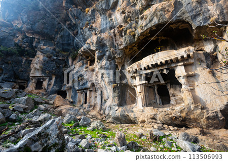Lycian rock hewn tombs carved into mountainside in Pinara, Turkey Lycian rock hewn tombs carved into mountainside in Pinara, Turkey 113506993