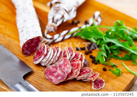 Sliced spanish sausage fuet Sliced spanish sausage fuet 113507245