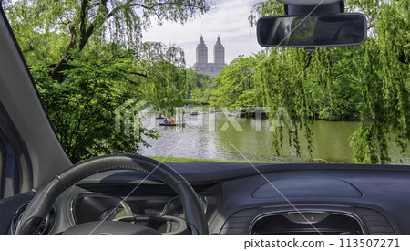 Car windshield view of Central Park, Manhattan, New York, USA 113507271