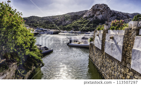 The scenic harbor of Poltu Quatu, Costa Smeralda, Sardinia, Italy 113507297