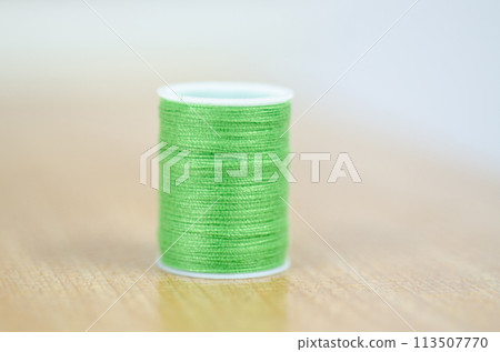 Yarn on brown table. Yarn on brown table. 113507770