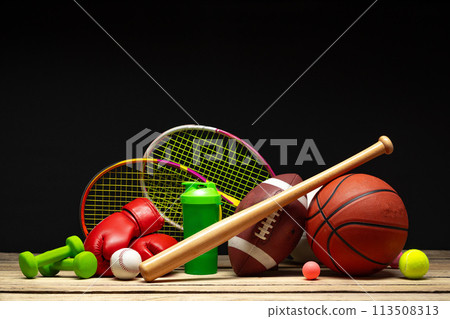 Various sports equipment on black background studio shot 113508313