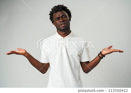 Man Standing With Hands Out in Front of Him palms facing up Man Standing With Hands Out in Front of Him palms facing up 113508422