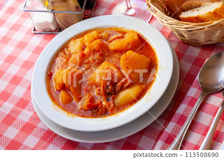 Stewed squid with potatoes Stewed squid with potatoes 113508690