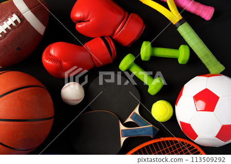 Various sports equipment on black background studio shot Various sports equipment on black background studio shot 113509292