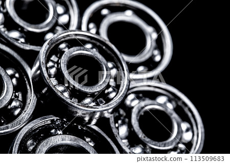 Metal gears on black background Metal gears on black background 113509683