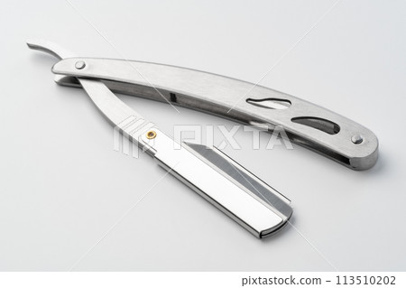 Sharp shaving blade isolated on white background Sharp shaving blade isolated on white background 113510202