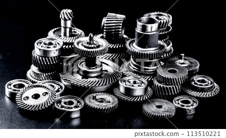 Metal gears on black background Metal gears on black background 113510221