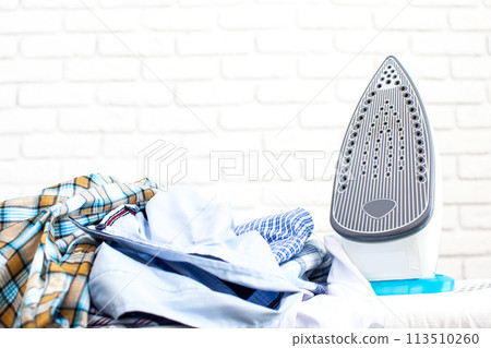 Electric iron and shirts Electric iron and shirts 113510260