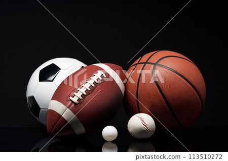 Various sports equipment on black background studio shot 113510272