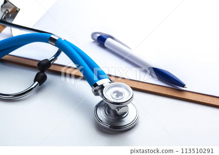 Empty prescription lying on table with stethoscope Empty prescription lying on table with stethoscope 113510291