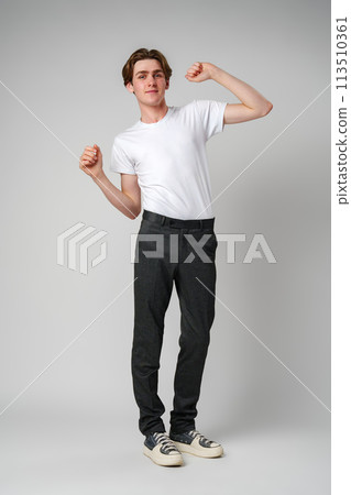 Young Man Dancing Alone in a Studio, Showing Off Casual Moves 113510361