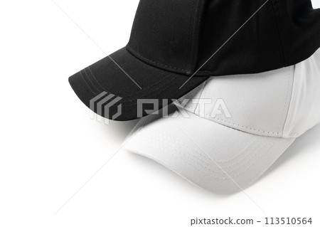 Two White and Black Hats on a White Background 113510564