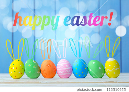 Easter eggs on wooden background 113510655