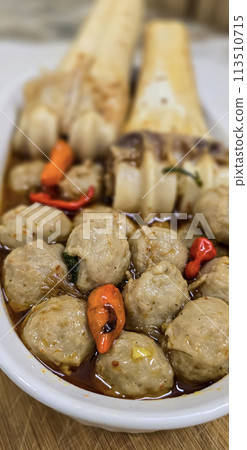 Delicious Indonesian meatballs with huge bones contains bone marrow in spicy beef broth and chilies 113510715