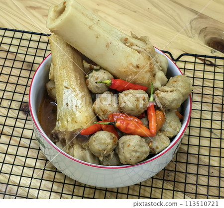 Delicious Indonesian meatballs with huge bones contains bone marrow in spicy beef broth and chilies Delicious Indonesian meatballs with huge bones contains bone marrow in spicy beef broth and chilies 113510721
