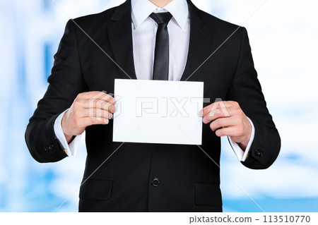 Businessman showing his business card Businessman showing his business card 113510770