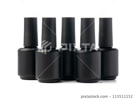 Black bottle of nail polish isolated on white background 113511152