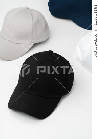 Different Colors of Hats on a White Background Different Colors of Hats on a White Background 113511162