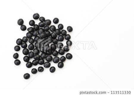 Black soybeans on white background 113511330
