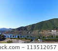 Autumn blue sky, lake and mountains of Gifu 113512057