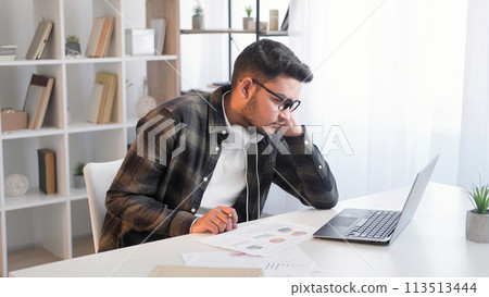Work pressure. Exhausted employee. Job burnout. Tired lazy sleepy man stressed with deadline overwork data mistake at laptop office desk with business documentation. Work pressure. Exhausted employee. Job burnout. Tired lazy sleepy man stressed with deadline overwork data mistake at laptop office desk with business documentation. 113513444