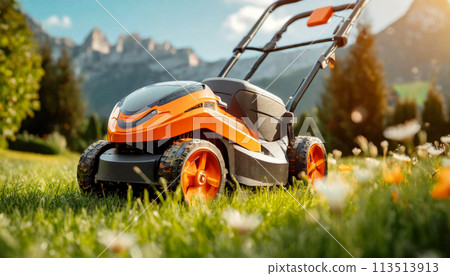 Orange and Black Lawn Mower on Green Grass in Mountain - Generative Ai 113513913