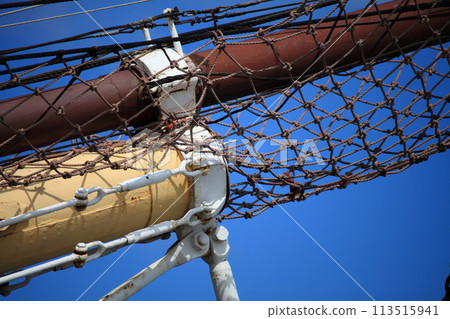 Masts and rope of sailing ship. 113515941