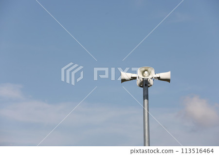 Horn speaker with blue sky background 113516464