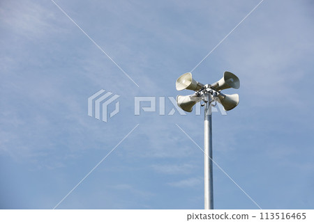 Horn speaker with blue sky background 113516465