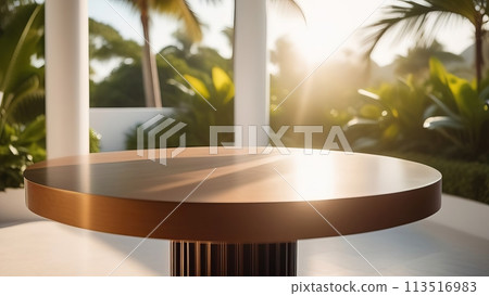 Round wooden table in warm sunlight, tropical backdrop. 113516983
