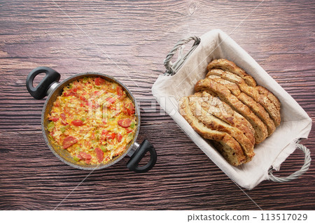 Turkish Menemen omelet in a frying pan. . Turkish Menemen omelet in a frying pan. . 113517029