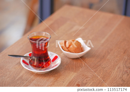 Traditional turkish tea on white table . Traditional turkish tea on white table . 113517174