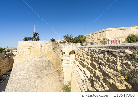 Ancient city walls in Valletta, Malta. 113517396