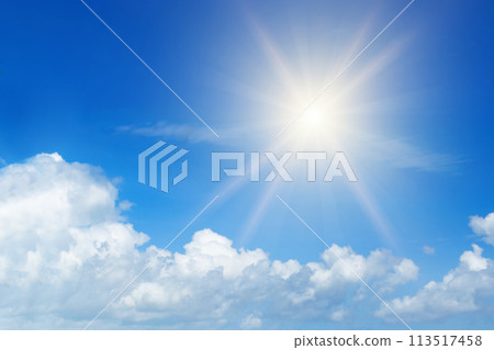 Bright sun on blue cloudy sky. Bright sun on blue cloudy sky. 113517458