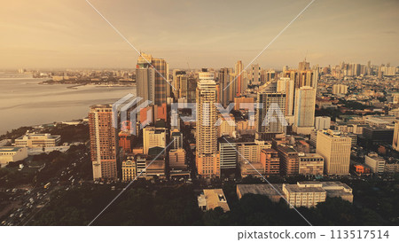 Slow motion skyscrapers cityscape at ocean bay aerial. Metropolis port city sun light landscape 113517514