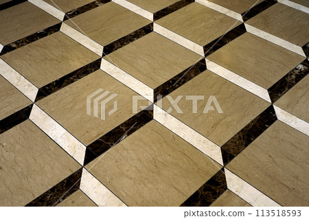 A close-up background image of a three-dimensional floor designed with three types of tiles 113518593