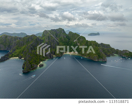 Tropical beaches on coastline in Miniloc Island. El Nido, Palawan. Philippines. 113518871