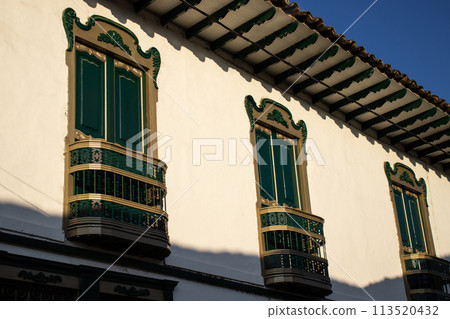 Beautiful facade of the houses at the historical downtown of the heritage town of Salamina located at the Caldas department in Colombia. 113520432