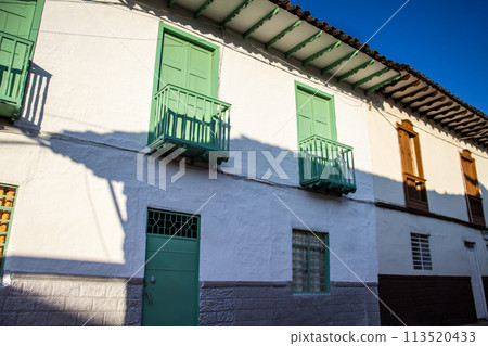 Beautiful facade of the houses at the historical downtown of the heritage town of Salamina located at the Caldas department in Colombia. Beautiful facade of the houses at the historical downtown of the heritage town of Salamina located at the Caldas department in Colombia. 113520433