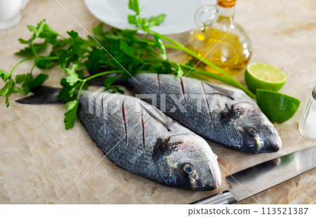 delicious and healthy lunch option is dorado baked with lime juice delicious and healthy lunch option is dorado baked with lime juice 113521387