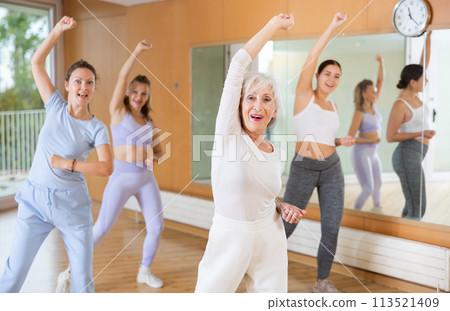 Women learning swing steps at dance class 113521409