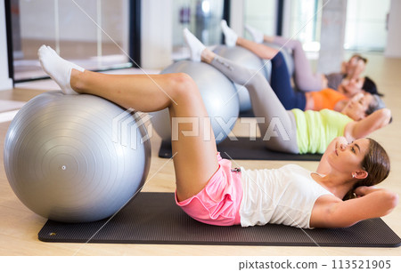 Pilates - women with exercise ball Pilates - women with exercise ball 113521905