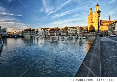 Evening in Zurich, the Limmat River and the Grossmünster Evening in Zurich, the Limmat River and the Grossmünster 113522458